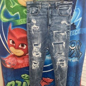 Dark blue distressed jeans